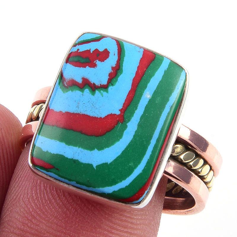 

Кольцо из двухцветного серебра 925 пробы с натуральным радужным лунным камнем S.10 d8a47