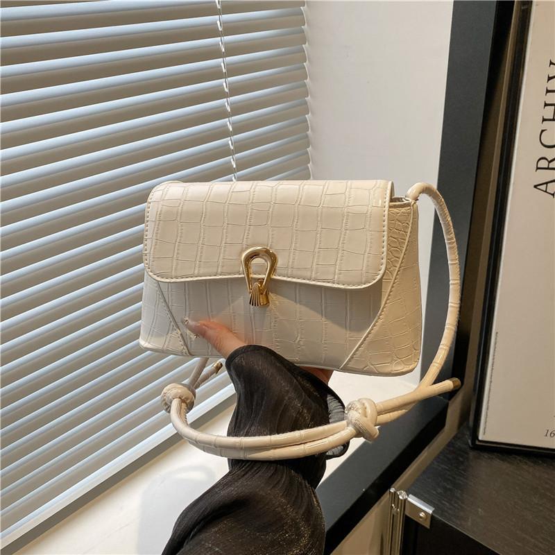 

Spring and summer high value temperament solid color women s urban commuting versatile portable shoulder messenger bag women s bag білий