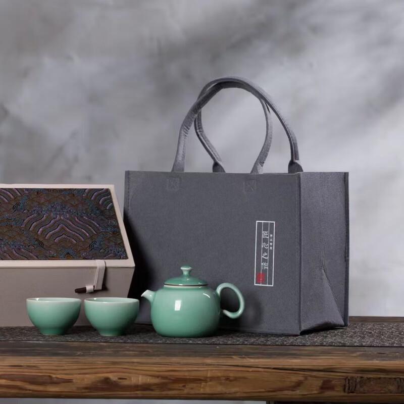 

Chinese Pottery Tea Set (One Pot, Two Cups)