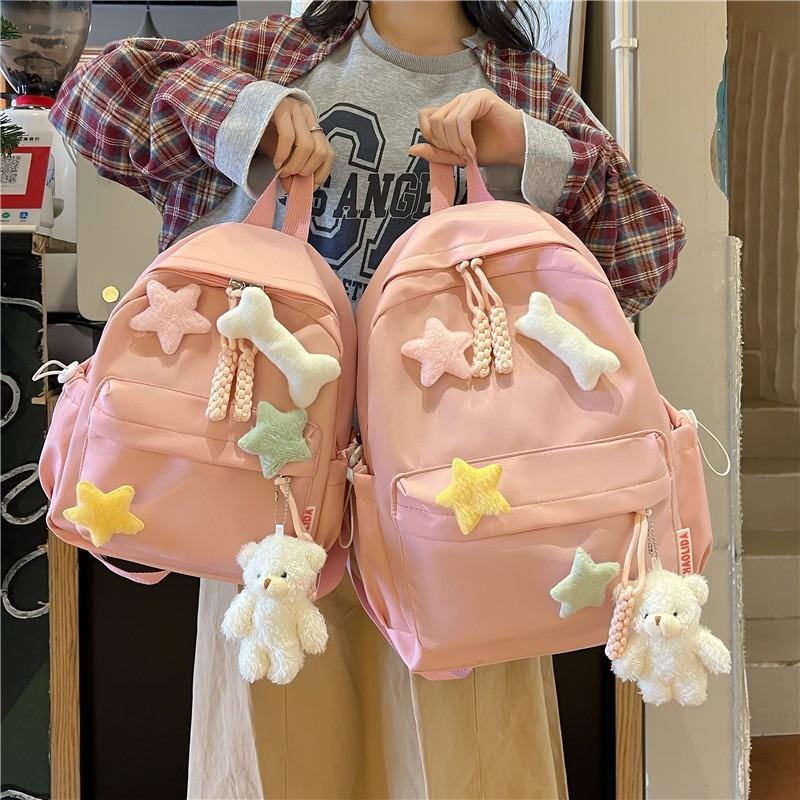 Koreanische Version der neuen süßen Schultasche Mädchen niedliche Sterne Mittelschüler gehen aus kleiner Rucksack große Kapazität Highschool-Rucksack