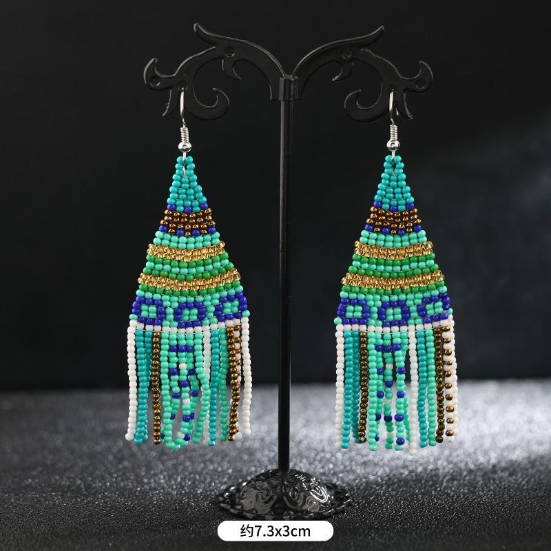 Brincos longos de borla feitos à mão com contas de arroz, nicho retrô boêmio, brincos de férias personalizados e estilosos