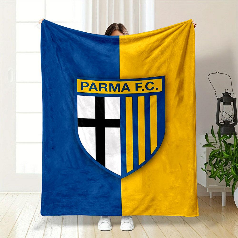 A shield logo with a black cross on white and yellow stripes on blue. for all seasons blanket lunch break throw gift