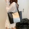 Retro einfache Patchwork-Kontrastfarben modische Tragetasche neue große Schultertasche Pendler-Handtasche