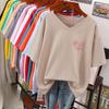 T-shirt a maniche corte, Ampia, Top V-neck stampato snellente per donna
