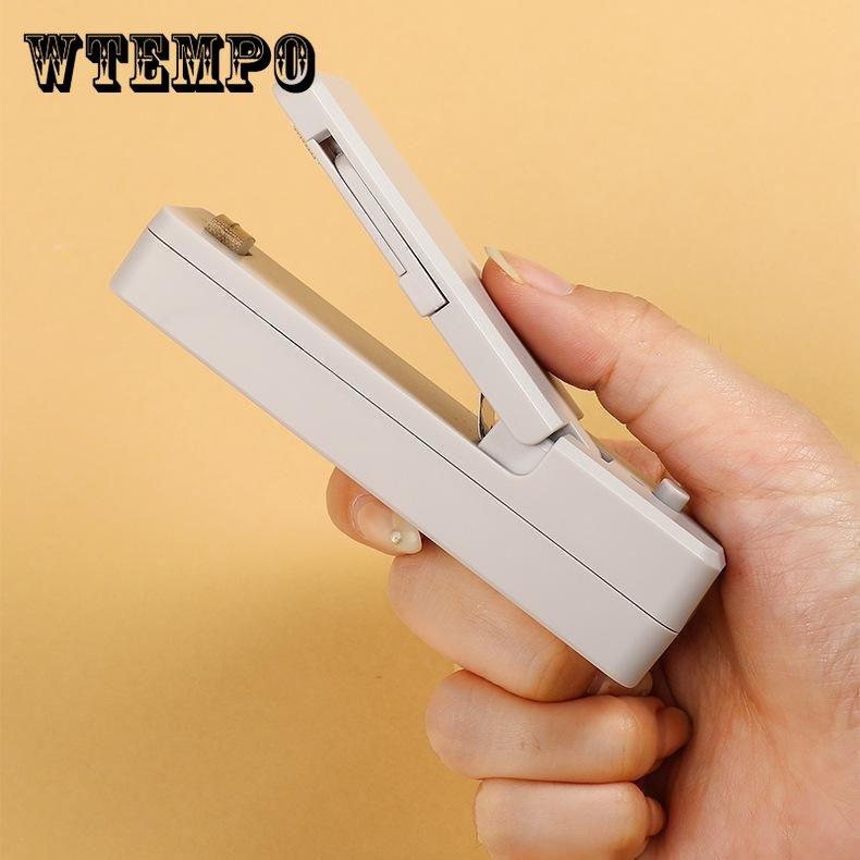 

Машина для запечатывания небольших бытовых зарядных портативных пластиковых пакетов для закусок, артефакт для запечатывания, мини-машина для запечатывания пластика 11.2*3.4*2.6cm розовый