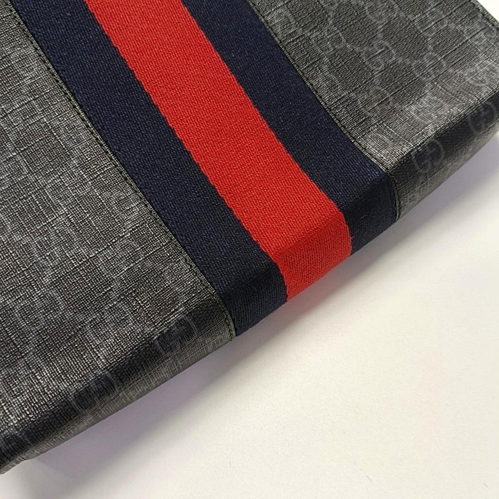 [Pre-Owned] Signature Logo Stripe Web Zipper Canvas Clutch - Very Good #1G2LX3S