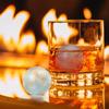 A Compact Spherical Cube of Ice Mold Featuring a 4-Grid Design for Whiskey, Ideal for Cocktails And Parties.