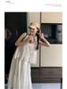 Trendy White Hollow Camisole Dress Set: Flattering Two-Piece Layered Vest & Dress
