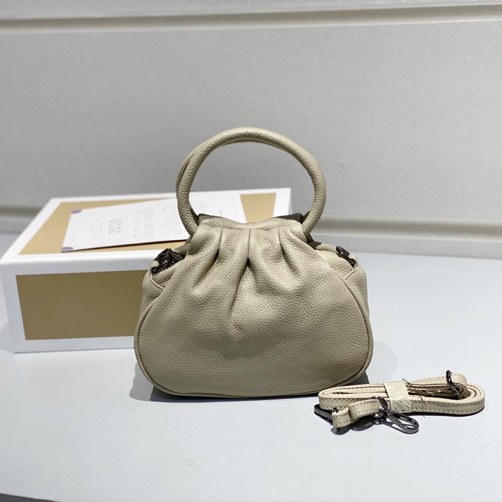 Bolsa Feminina de Couro Genuíno 2025 Nova Retrô Couro Bovino Camada Superior Bolsa de Mão Simples Versátil Tote Fabricante