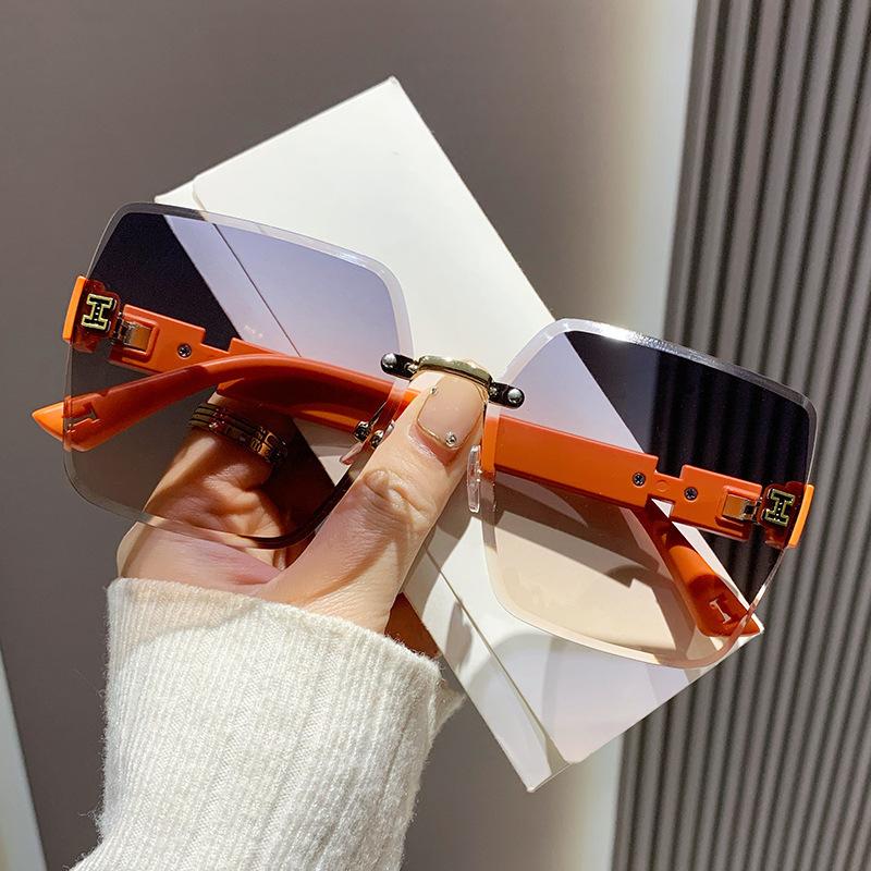 2025 new frameless two-color gradual change high-end women's trend driving sunglasses fashion sunglasses