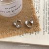 Geometric new ear clips without piercings, simple niche circle twist earrings, cold wind mosquito coil disc earrings, advanced sense