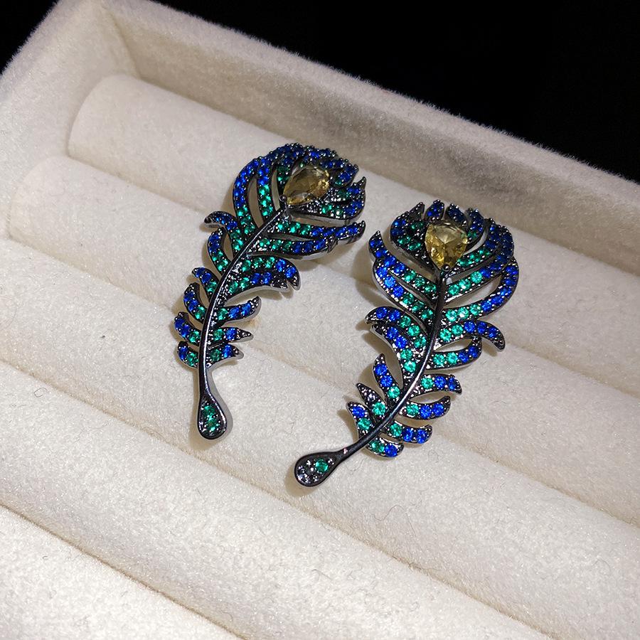 

Medieval vintage silver needle zircon feather fringed earrings light luxury premium stud earrings retro court style earrings
