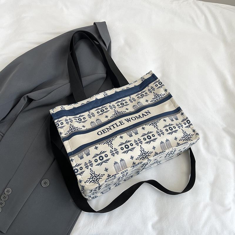 

Fashion printed shoulder bag women s 2025 new large-capacity bucket bag niche retro large-capacity portable tote bag