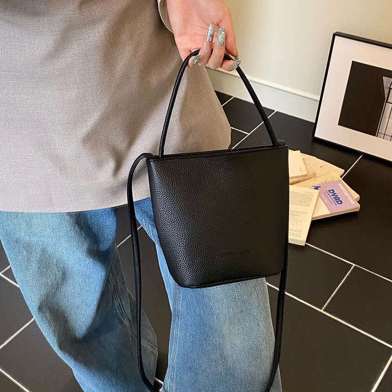 Simple and trendy hand-carried bucket bag women's 2025 spring and summer new fashion versatile shoulder bag niche high-end women's bag