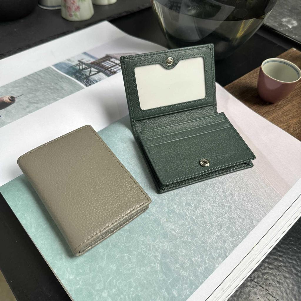 Premium Leather Card Holder: Unisex Cowhide Business Case with Mirror Window, Snap Closure & Coin Purse.