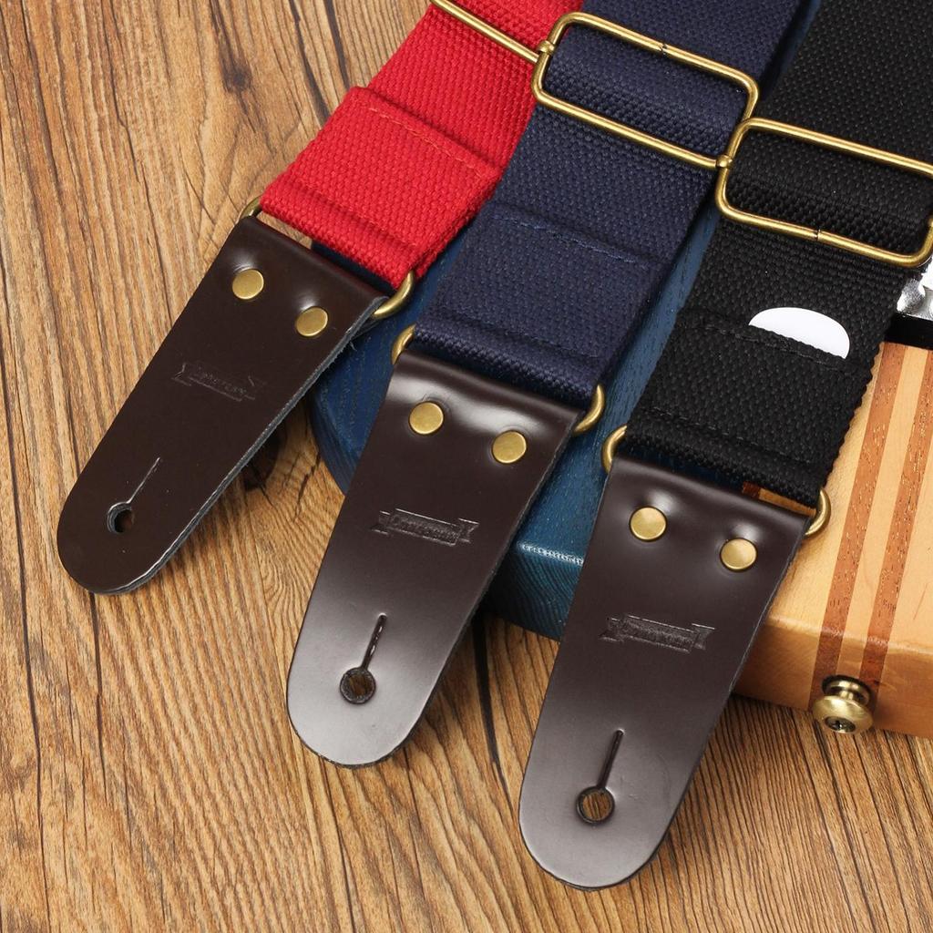 Gitarrengurt aus Baumwolle mit Enden aus echtem Leder für Akustik-/Elektro-/Bassgitarre mit 1 Gurtknopf aus PU-Leder und 2 Gurtverschlüssen