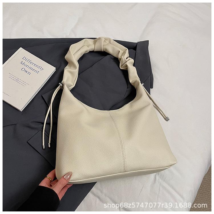 Large capacity bag women's spring and summer 2025 new fashion shoulder bag pleated texture child and mother bucket commuter tote bag