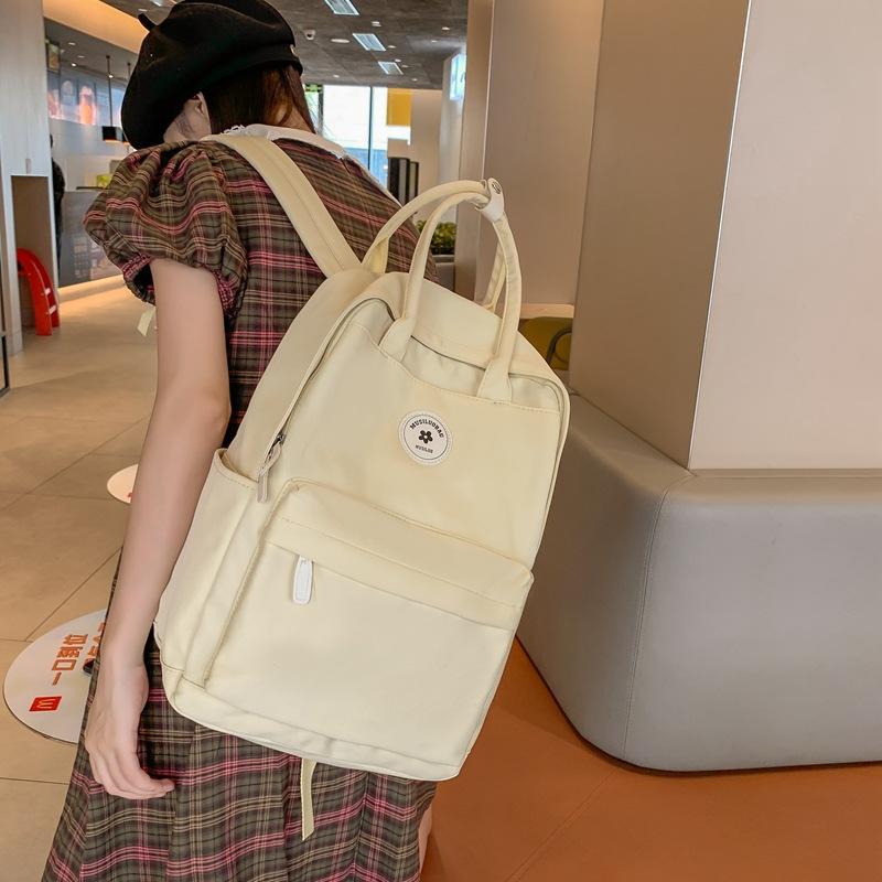 Japanese Ins Girl Backpack Korean Version of Junior High School Student Schoolbag Female Tide Large Capacity Solid Color Nylon Handbag