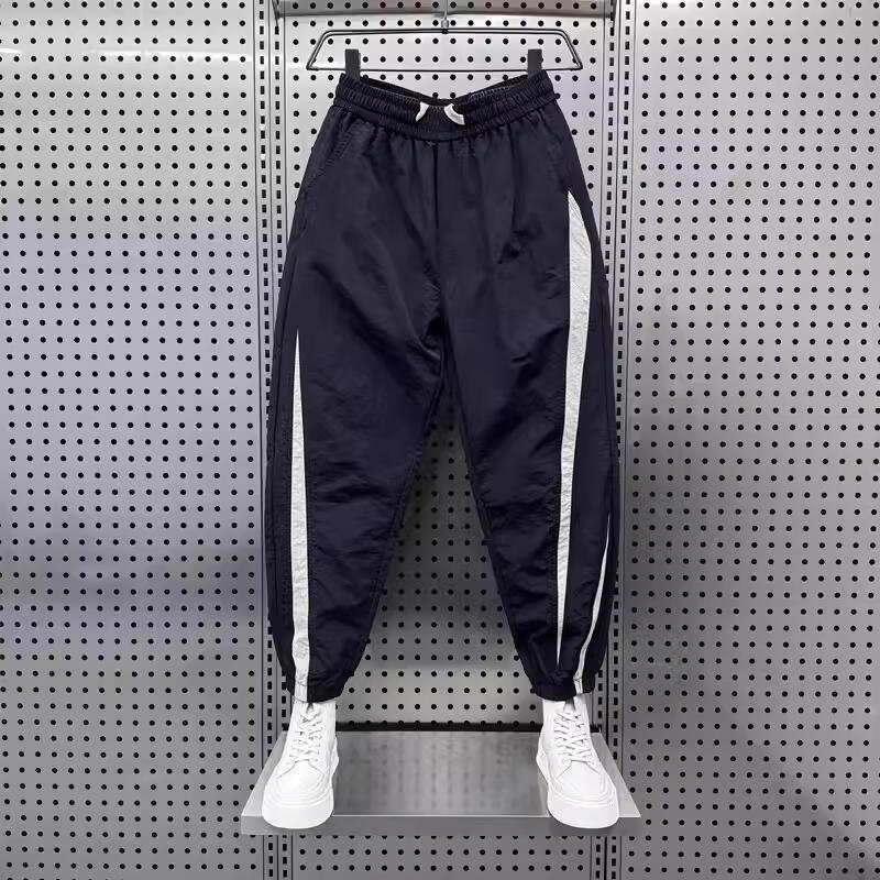 Men's Stylish Ice Silk Quick-Dry Harem Pants - Spliced, Fashionable, Versatile, and Trendy for Spring and Summer.