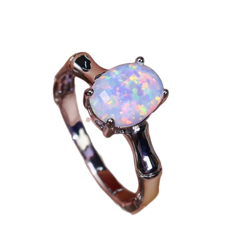 Wish Simple White Opal Egg Shaped Bamboo Four-claw Ring Personalized Light Luxury Ring Ring Women