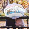 Portable travel umbrella with cute Sanrio character designs, UV-protective folding umbrella.