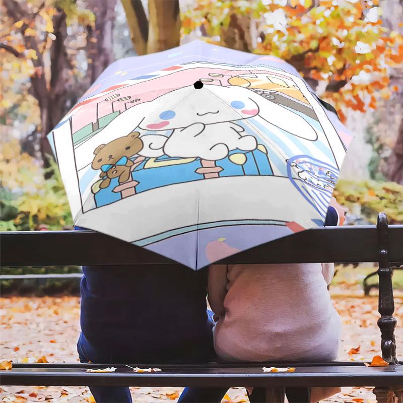 Portable travel umbrella with cute Sanrio character designs, UV-protective folding umbrella.