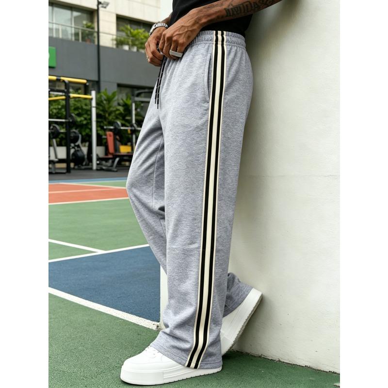 American sticker black and white strip casual trousers men's solid color street fitness running sports trousers straight sweatpants