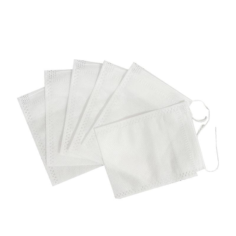 

Набор из 100 штук нетканых чайных пакетиков с завязками для рассыпного чая, трав и специй - 5 х 7 см 100PCS белый