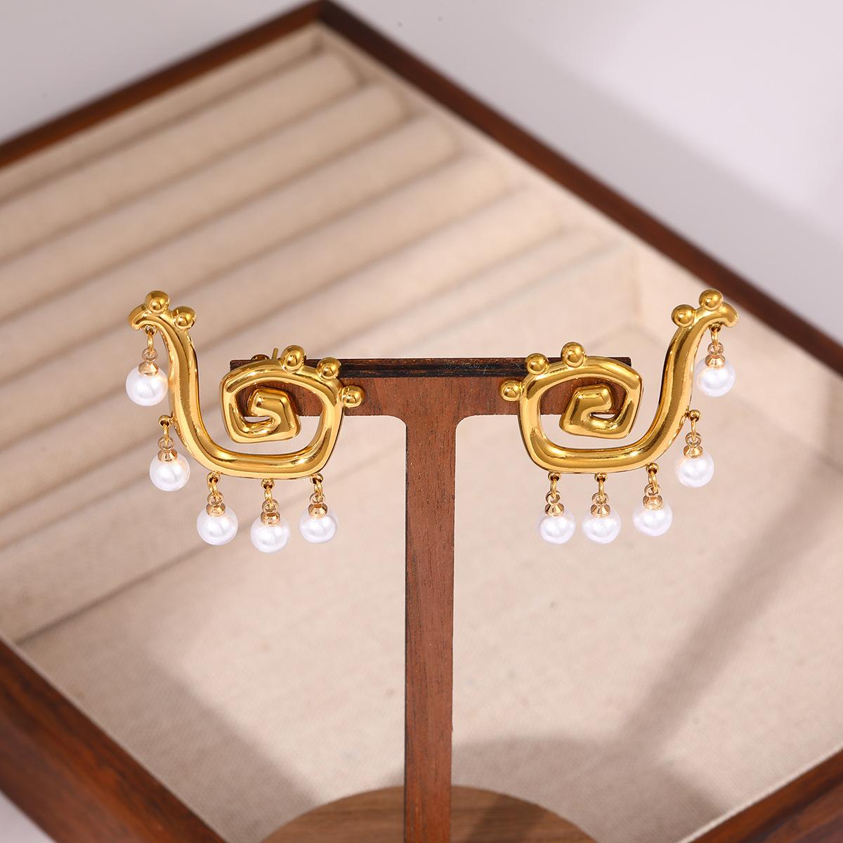 

Модные серьги-подвески для женщин золотой