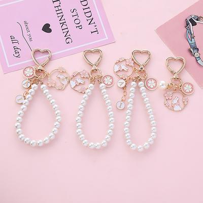 Portachiavi Fiori di Ciliegio Rosa Dolce Ciondolo Coniglio per Telefono Lettera Perla Anello Portachiavi per Auto Ciondoli Decorazioni Borsa Accessori