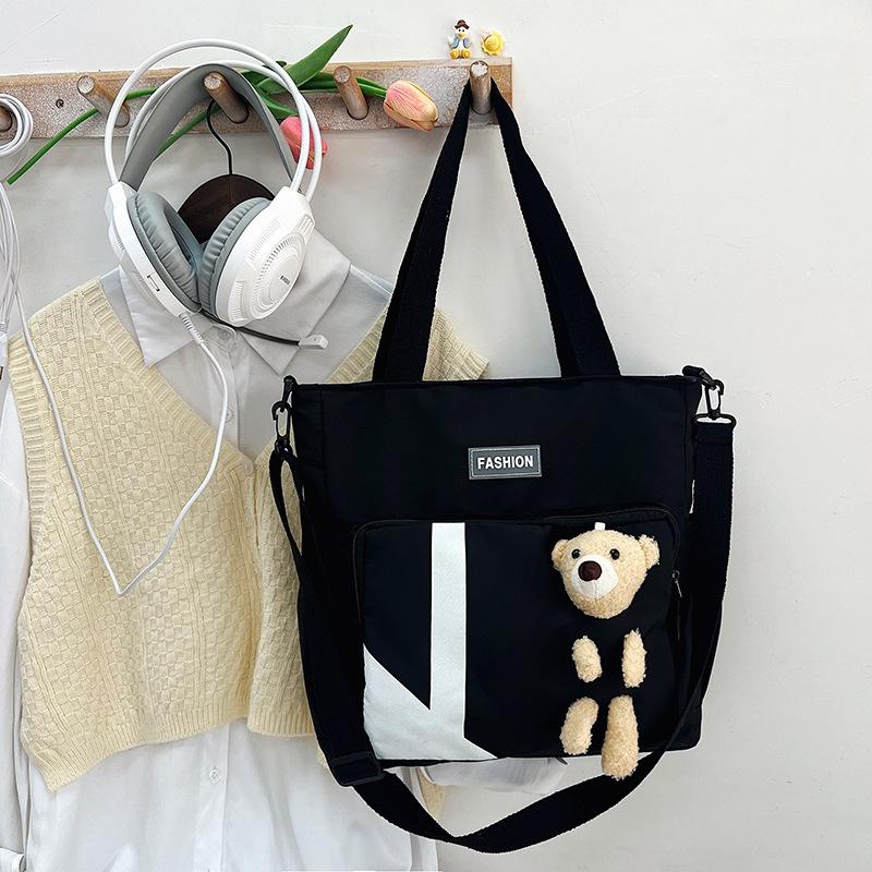 

Women s bag large-capacity student new shoulder bag contrasting color messenger bag tote bag рожевий