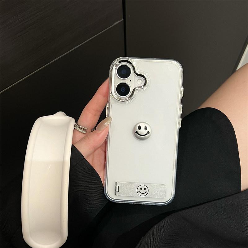 

Металлическая оправа линз Прозрачный мягкий чехол-подставка из ТПУ со смайликом для iPhone 16 Pro Max 15 14 Plus 13 12 11 Pro 7 8 XS XR Защита от падений iPhone 16