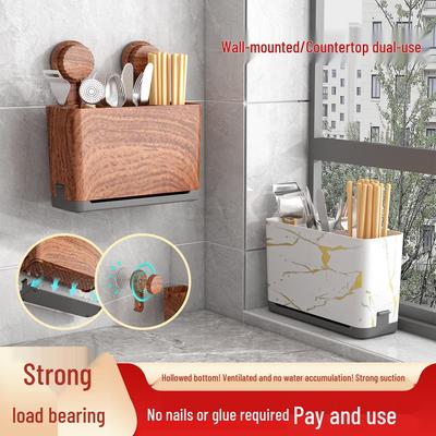 Montowany na ścianie ociekacz i stojak do przechowywania pałeczek i sztućców