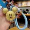 Disney Porte-clés Lanière Tête de Mickey Dorée Visage Doré Accessoire Double Usage Coque Transparente Résistante aux Rayures Design Portable et Anti-perte