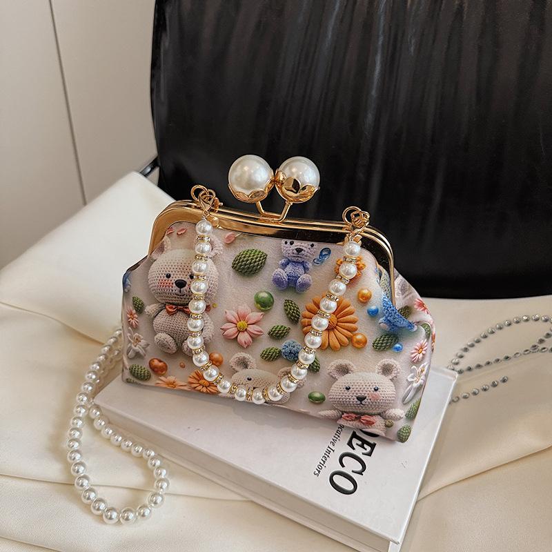 

Cartoon printed bag women s 2025 new clip bag light shoulder commuter bag fashionable sweet fresh messenger bag 20*6*13