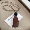 Retro Ethnic Ceramic Wood Necklace: Geometric Fruit Pendant for Women