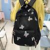Butterfly Embroidery Backpack Casual Daily Bag Large Capacity School Bag for Students Commuters Minimalist Fashion Design with Tassel Details