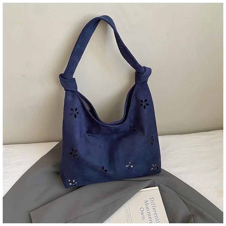 Tasche im College-Stil Damen lässige hohle Tragetasche ausländischer Stil Wildleder Umhängetasche Damen Pendler Achseltasche