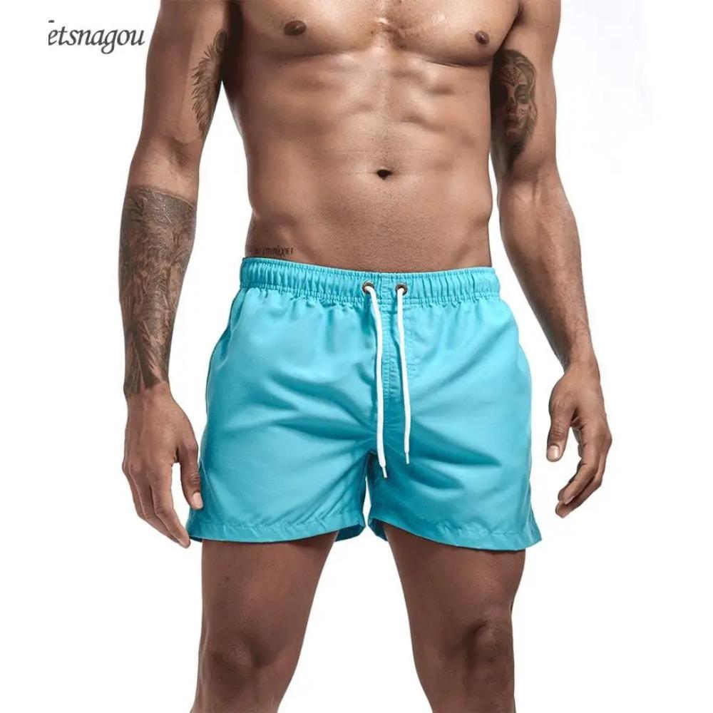 Costume da Bagno da Uomo Estivo Asciugatura Rapida Traspirante con Tasche Pantaloncini da Spiaggia e Surf