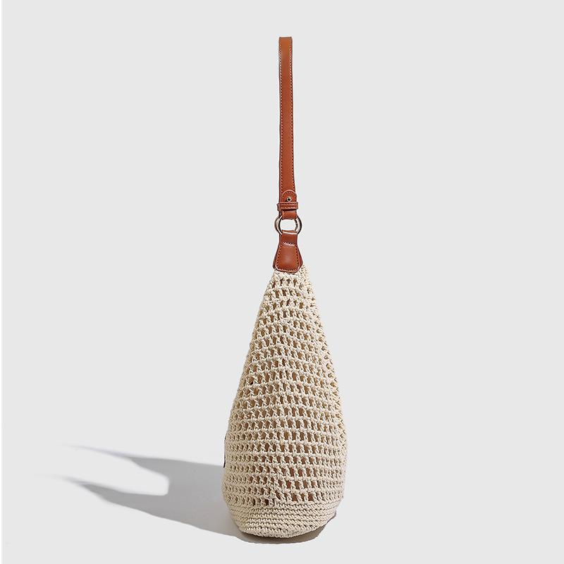 Tasche Luxus Nische High-End Gewebte Hohltasche für Damen Fauler Stil Häkeln Einzelne Schulter Pendlertasche Damen Strohtasche