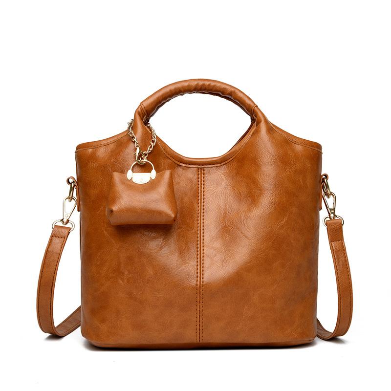 A Fashionable and Retro Hand-held Bucket Bag for Women A High-end and Versatile Single-shoulder Crossbody Bag