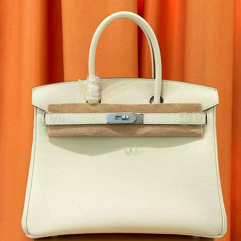 Li-Muster Togo-Leder 25/30/35 cm Rindsleder erste Schicht tragbare Pendlertasche Damen Goldene Schnallenverzierung