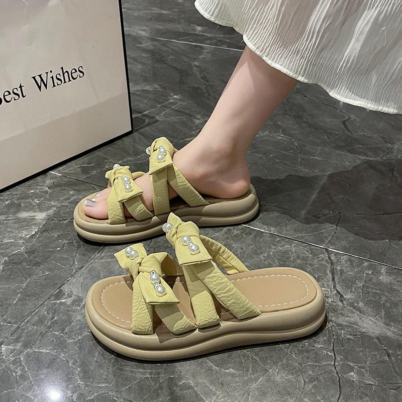 thick-soled pearl slippers for women to wear in the summer of 2025, the new fairy style fashion bow muffin open-toed sandals
