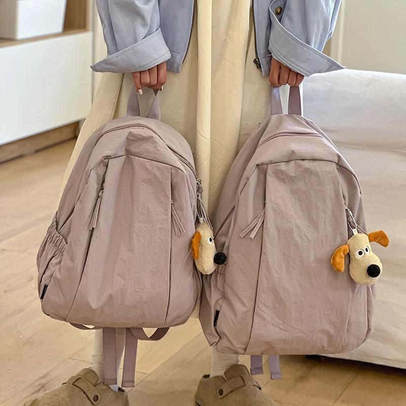 Travel lightweight advanced sense niche backpack college student commuter junior high school girls schoolbag Japanese and Korean simple backpack