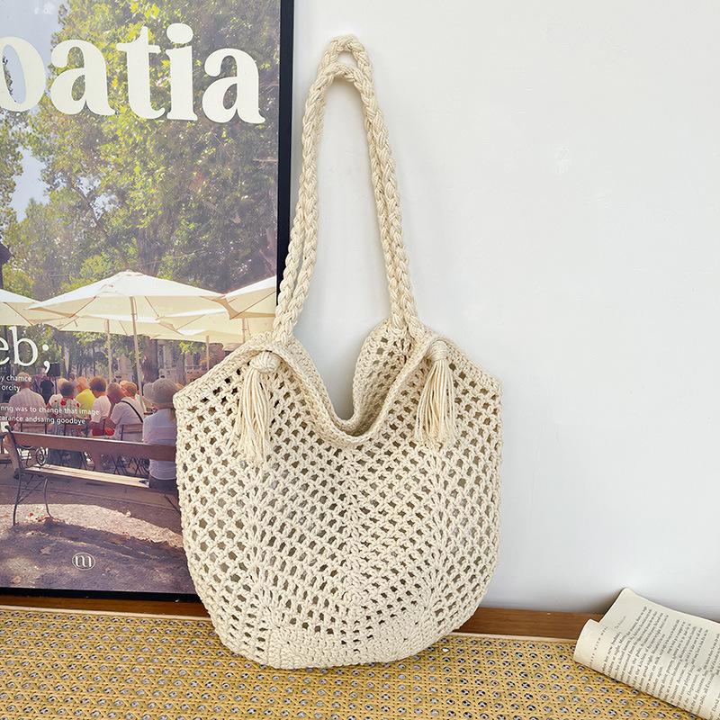 Hollow knitted bag women's large-capacity new summer shoulder knitted bag seaside vacation beach bag