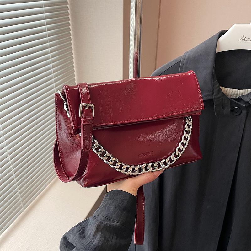 

2024 нова шкіряна сумка на ланцюжку з масляним воском модна корейська версія повсякденної сумки через плече модна темпераментна складна сумка під пахвами 28*7*17