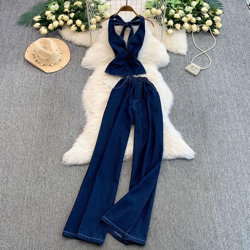 

European and American Sexy V-neck Twist Waist Hugging Hanging Neck Denim Vest Top + High Waist Slimming Flared Wide Leg Trousers Set Royal Blue L