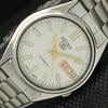 USED VINTAGE SEIKO 5 AUTOMATIC JAPAN MENS DAY/DATE SILVER WATCH 607-a314709-2 SKU607-a314709