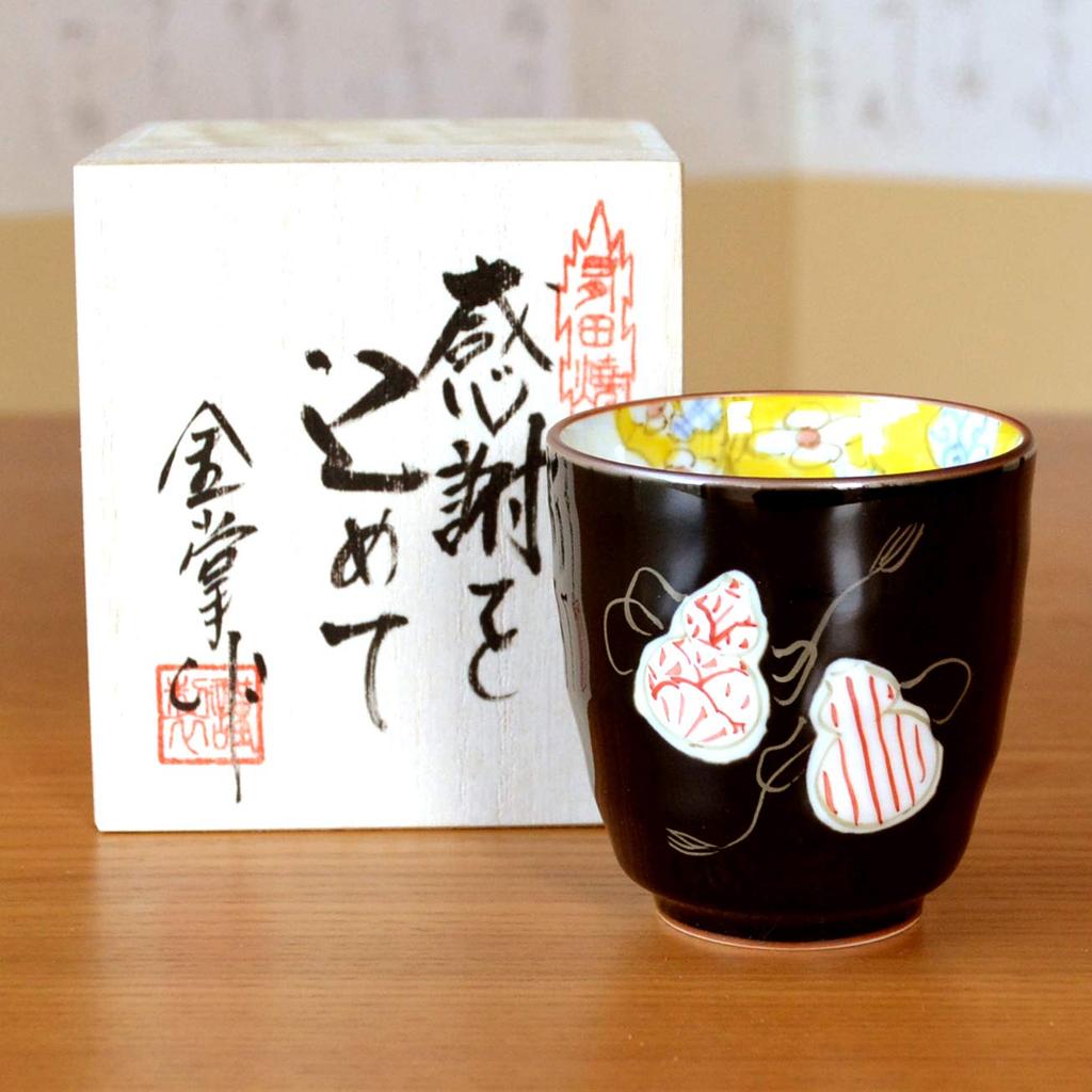 Auspicious gift for women celebrating wishing them good health and Arita ware with a Comes in a wooden box with retirement, prosperity. teacup, red,
