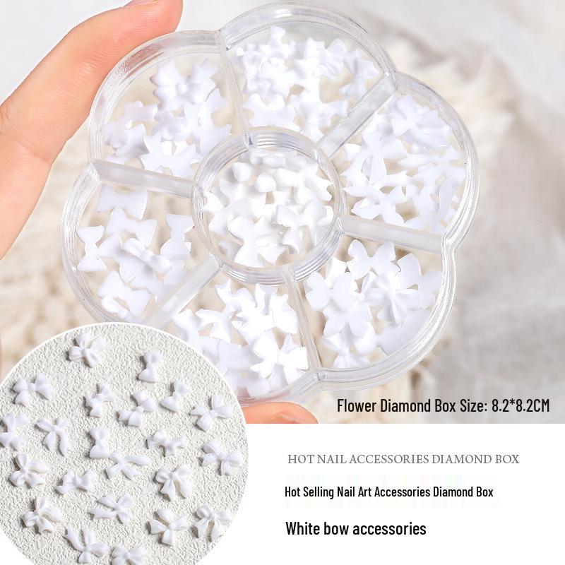 

Набор для нейл-арта «Аврора»: Радужный бант, Смешанный жемчуг, Стразы в виде мишек, Лоток с 7 отделениями